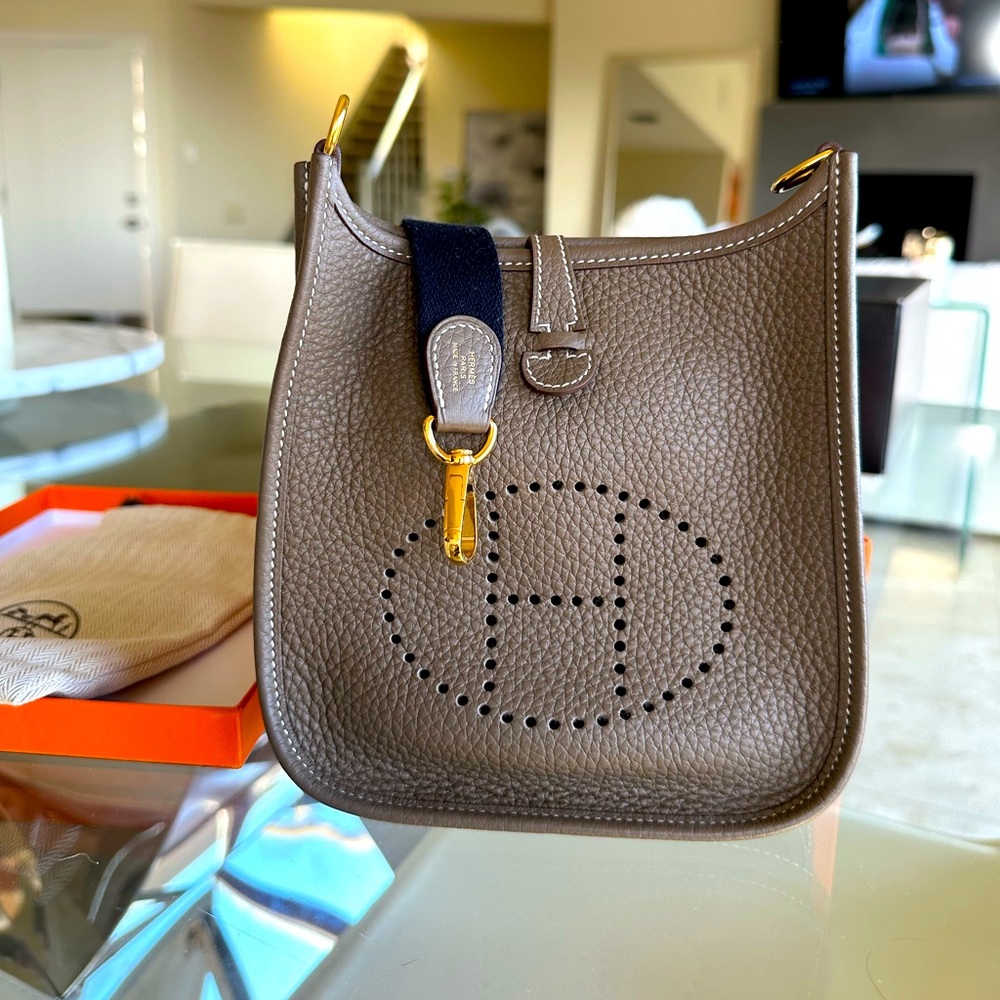 HERMES Taurillon Clemence Amazone Evelyne TPM in Etoupe and Bleu Indigo.